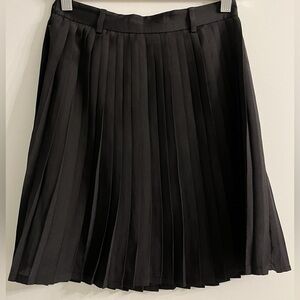 Pleated flowy Black Skirt size 6 with belt hoops